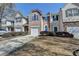 Attractive townhome with manicured landscaping, individual driveways, and attached garages at 5835 Terremont Cir, Norcross, GA 30093