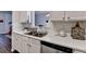 Kitchen features stainless steel dishwasher and lots of natural light at 5835 Terremont Cir, Norcross, GA 30093