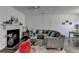 Cozy living room with a fireplace, plush seating, and stylish decor, perfect for relaxing and entertaining at 5835 Terremont Cir, Norcross, GA 30093
