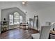 Bright home office with vaulted ceilings, natural light, desk area, and hardwood flooring at 5835 Terremont Cir, Norcross, GA 30093