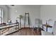 Home office with desk, floor lamp, and decorative ladder for blankets at 5835 Terremont Cir, Norcross, GA 30093