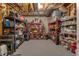 Unfinished basement used for storage with metal shelving units and other storage solutions at 121 Rising Star Rd, Fayetteville, GA 30215