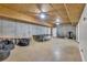 Finished basement with ping pong table, gym equipment, bean bag chairs, and exposed ceilings at 121 Rising Star Rd, Fayetteville, GA 30215