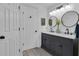 A bathroom shows double sinks and decorative lighting at 121 Rising Star Rd, Fayetteville, GA 30215