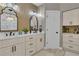 Stylish bathroom with dual vanity, custom tile backsplash, and modern fixtures at 121 Rising Star Rd, Fayetteville, GA 30215