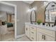 Bathroom with dual vanity, custom backsplash, and marble floors at 121 Rising Star Rd, Fayetteville, GA 30215