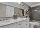 Bathroom featuring double sinks, marble countertops, and a tiled shower-tub combo at 121 Rising Star Rd, Fayetteville, GA 30215