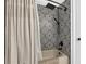Shower boasts decorative tilework and a showerhead at 121 Rising Star Rd, Fayetteville, GA 30215