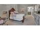 Cozy bedroom with soft carpet, comfortable bed, stylish furniture, and plenty of natural light at 121 Rising Star Rd, Fayetteville, GA 30215