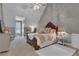 Elegant bedroom featuring a crystal ceiling fan, carpet, and gray walls at 121 Rising Star Rd, Fayetteville, GA 30215
