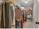 Spacious closet with ample storage, featuring shelving and hanging rods for organized clothing at 121 Rising Star Rd, Fayetteville, GA 30215