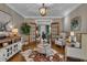 Elegant living room featuring French doors, stylish furnishings, and lots of natural light at 121 Rising Star Rd, Fayetteville, GA 30215