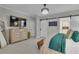 Spacious bedroom with a decorative accent wall, and access to an ensuite bathroom at 121 Rising Star Rd, Fayetteville, GA 30215