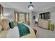 Large main bedroom with sitting area, built-in media cabinet and lots of natural light at 121 Rising Star Rd, Fayetteville, GA 30215
