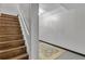 View of hardwood stairs leading to lower level at 121 Rising Star Rd, Fayetteville, GA 30215