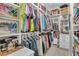 Spacious walk-in closet with custom shelving and ample storage for clothing, shoes, and accessories at 121 Rising Star Rd, Fayetteville, GA 30215