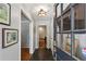 Welcoming entryway with slate tile flooring, stylish lighting, and decorative wall art at 205 Glencourtney Dr, Sandy Springs, GA 30328