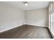 An empty bedroom featuring hardwood floors and trim at 269 Devin Ne Pl, Atlanta, GA 30305