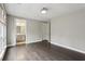 Bedroom with hardwood floors and an open doorway to a bathroom at 269 Devin Ne Pl, Atlanta, GA 30305