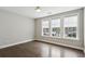 Bedroom featuring hardwood floors, neutral paint and bright windows at 269 Devin Ne Pl, Atlanta, GA 30305