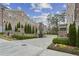 Beautifully landscaped Hillgrove community entrance showcasing vibrant flowers and manicured greenery at 269 Devin Ne Pl, Atlanta, GA 30305
