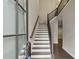 Grand entryway with elegant staircase, dark wood flooring, and transom window at 269 Devin Ne Pl, Atlanta, GA 30305