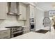 Gourmet kitchen featuring stainless steel appliances and a marble countertop at 269 Devin Ne Pl, Atlanta, GA 30305