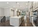 Modern kitchen featuring a spacious island, stainless steel appliances, and hardwood floors at 269 Devin Ne Pl, Atlanta, GA 30305