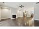 Open-concept living area with fireplace, hardwood floors, and modern fixtures at 269 Devin Ne Pl, Atlanta, GA 30305