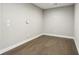 Empty room with hardwood floors, neutral paint and white trim at 269 Devin Ne Pl, Atlanta, GA 30305