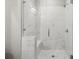 Walk-in shower with stone tiling and a glass enclosure at 269 Devin Ne Pl, Atlanta, GA 30305