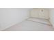 Attic space with neutral carpet, patterned wallpaper, and a dormer door offers potential for expansion at 5269 Wyntercreek Dr, Atlanta, GA 30338