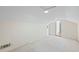 Finished attic space with neutral carpet, patterned wallpaper, and recessed lighting offers potential as a bonus room at 5269 Wyntercreek Dr, Atlanta, GA 30338