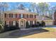 Charming brick home with well-manicured landscaping and a two-car garage at 5269 Wyntercreek Dr, Atlanta, GA 30338