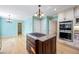Kitchen with an island gas cooktop, granite countertops, stainless steel appliances, and eat in dining area at 5269 Wyntercreek Dr, Atlanta, GA 30338