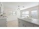 Bright kitchen with tiled floor, white cabinetry and natural light at 5269 Wyntercreek Dr, Atlanta, GA 30338