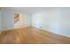 Comfortable living room with hardwood floors and an open doorway to the hall at 5269 Wyntercreek Dr, Atlanta, GA 30338