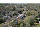 Overhead shot of townhomes in a charming neighborhood surrounded by lush trees, offering a serene suburban setting at 1228 Church St, Decatur, GA 30030