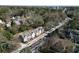 Aerial view of townhomes, showcasing the building's architecture and surrounding neighborhood in a tree-lined community at 1228 Church St, Decatur, GA 30030