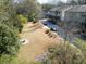 Spacious backyard with a fire pit, surrounded by trees offering a relaxing outdoor space and community parking at 1228 Church St, Decatur, GA 30030