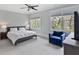 Comfortable bedroom with a ceiling fan, plush carpeting, and lots of natural light at 1228 Church St, Decatur, GA 30030