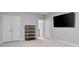 Bonus room with big TV, carpet, neutral paint and baseboards and built-in storage at 1228 Church St, Decatur, GA 30030