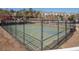 A fully fenced community basketball court provides a safe and fun place for residents to play basketball at 1871 Shiloh Valley Nw Way, Kennesaw, GA 30144
