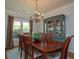 Formal dining room with hardwood floors, a chandelier, and traditional furniture at 1871 Shiloh Valley Nw Way, Kennesaw, GA 30144