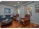 Comfortable living room with hardwood floors, ample seating, natural light, and stylish decor at 1871 Shiloh Valley Nw Way, Kennesaw, GA 30144