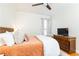 Inviting bedroom with hardwood floors, ceiling fan, and window for natural light at 3777 Peachtree Ne Rd # 1530, Atlanta, GA 30319