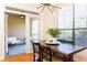 Dining area with a contemporary light fixture, patio access, and natural light creates inviting atmosphere at 3777 Peachtree Ne Rd # 1530, Atlanta, GA 30319