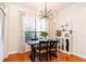 Dining room featuring a modern chandelier, dining table, and a window with natural light at 3777 Peachtree Ne Rd # 1530, Atlanta, GA 30319