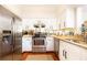 Modern kitchen features stainless steel appliances, granite countertops, and updated cabinetry at 3777 Peachtree Ne Rd # 1530, Atlanta, GA 30319