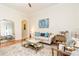 Inviting living room with hardwood floors, open layout, stylish decor, and lots of natural light at 3777 Peachtree Ne Rd # 1530, Atlanta, GA 30319